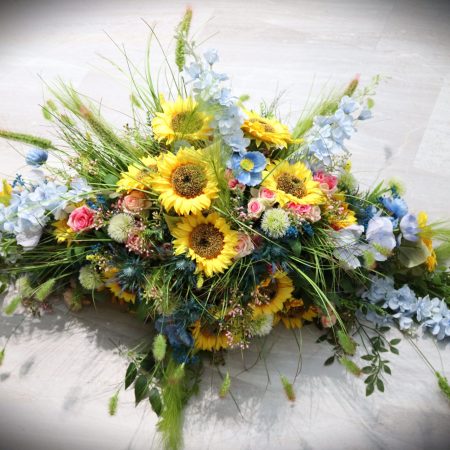 Sunflower and Blue Meadow Casket Spray