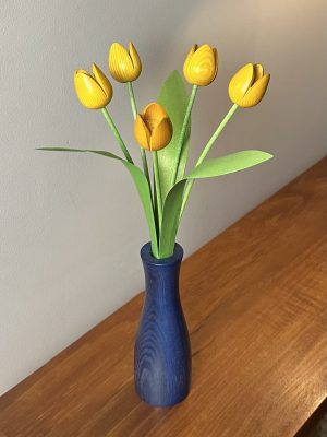 5 yellow tulips with blue 'cool' vase