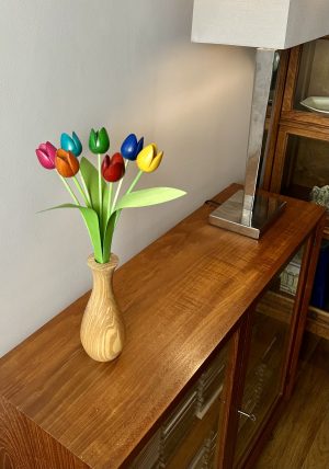 7 mixed colour classic tulips with natural 'club' classic vase