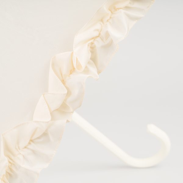 Elegant ivory wedding umbrella with ruffled frill design for special occasions.