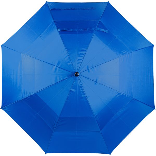 Blue wind-resistant golf umbrella with automatic opening mechanism.