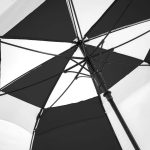 Black and white wind-resistant golf umbrella with fibre auto opening mechanism.