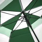 Close-up of green and white golf umbrella frame and ribs.