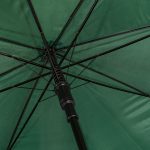 Close-up of green wind-resistant golf umbrella with sturdy frame.