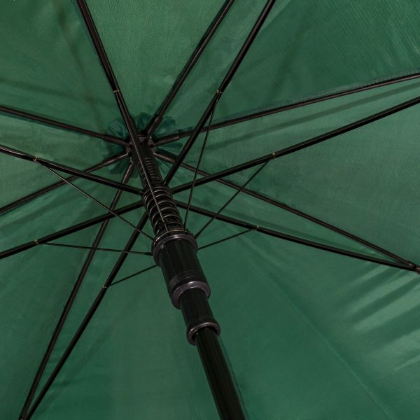 Close-up of green wind-resistant golf umbrella with sturdy frame.