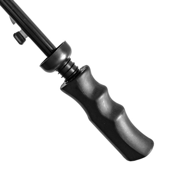 Close-up of black golf umbrella handle for wind resistance.