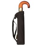 Compact black umbrella with wooden handle and protective cover.