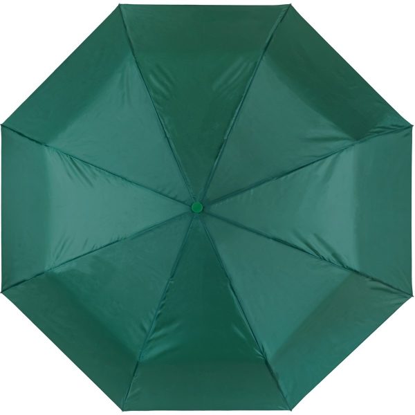 Green compact umbrella for travel and everyday use.
