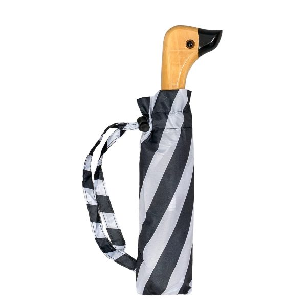 Duck head umbrella with black and white polka dot pattern.