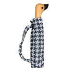 White and black polka dot duck head umbrella with wooden handle.