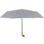 White and black polka dot umbrella with duck head handle.