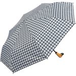 Black and white houndstooth umbrella with wooden handle.