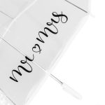 White umbrella with 'Mr & Mrs' text and heart symbol in black.