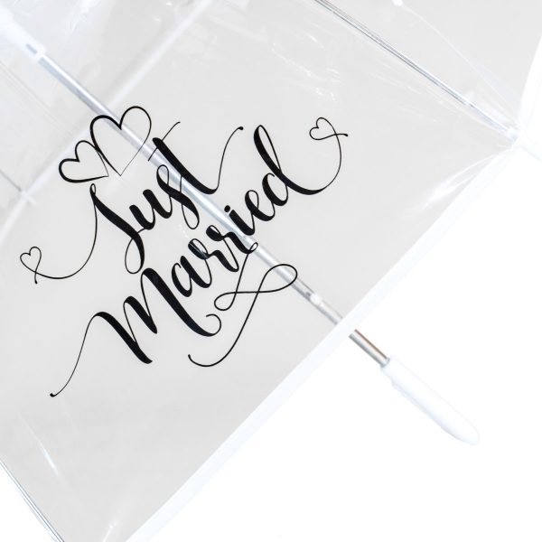 Clear umbrella with 'Just Married' written inside, wedding-themed.