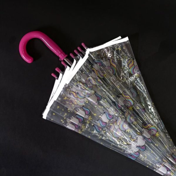 Children's unicorn umbrella with clear dome and pink handle for kids.