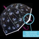 Transparent umbrella with unicorn and star pattern, reflective safety strip.