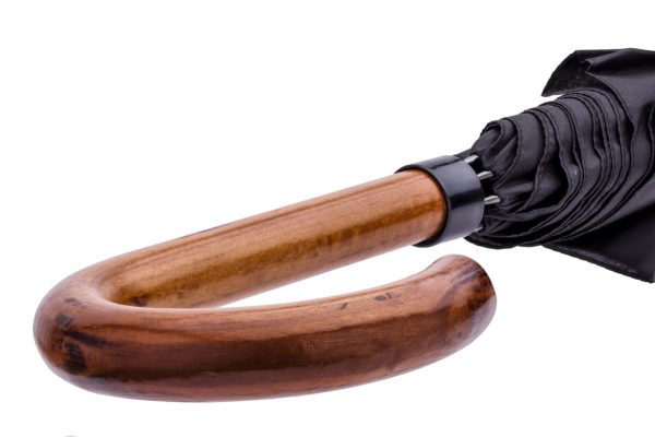 Wooden handle umbrella with black canopy for city walking.