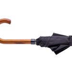 Black compact umbrella with wooden curved handle on white background.